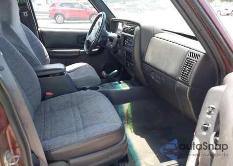 2000 Jeep Cherokee Sport z USA, uszkodzony, nr VIN 1J4FF48S7YL129654